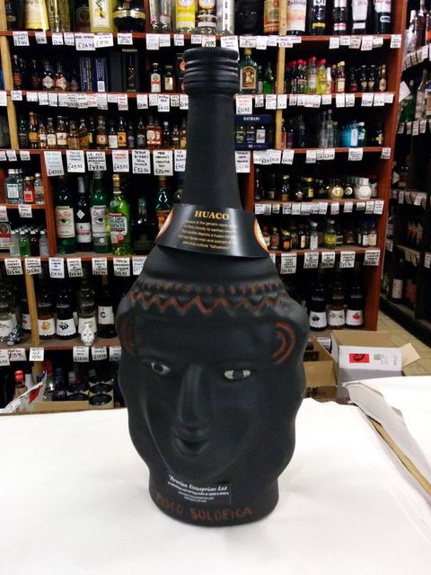 Head-shaped Pisco bottle, Soho, London, UK