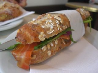 Smoked Salmon, Creme Fraiche, Capers, Onion, Roquette, multigrain baguette - The French Quarter
