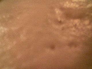 Foam in a glass of Kronenbourg 1664 beer