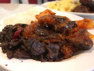 Plain rice with crisp beef lungs, sambal eggplant and curried potatoes - Minang Nasi Padang AUD6.50