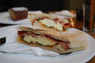 Bacon and Scrambled Egg Toasted Roll with sweet chilli sauce - Dancing Goat Cafe