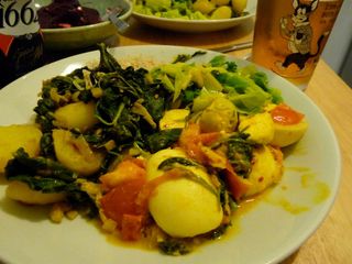 Egg curry with cabbage foogath, saag aloo and rice
