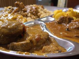 Biryani Rice with Goat Masala and Lamb Rogan Josh - Zam Zam