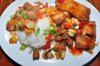 sweet and sour pork with spring rolls