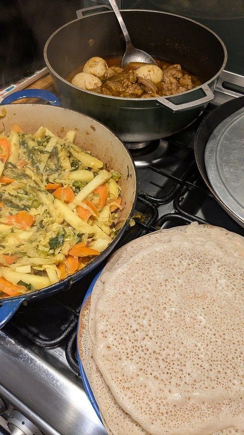 Doro wat, tikil gomen with injera