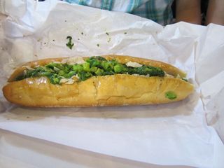 Italian roast pork sandwich with Provolone cheese and greens (spinich and broccoli rabe) from DiNic's