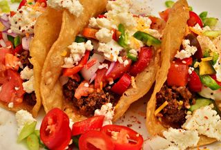 Mmm... Tacos - chorizo, queso fresco, onions, tomatoes, jalapenos, sour cream, corn tortillas