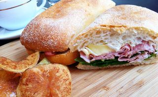 Double smoked ham, truffle brie and spinach on house made Pide bread at Speakeasy