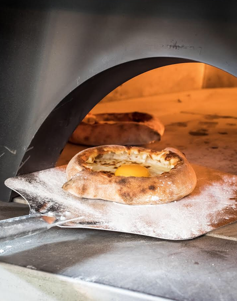 Adjarian khachapuri in an oven