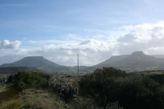 File:Monte Santu e Monte S. Antonio (Pelau), Siligo, Sardinia.jpg