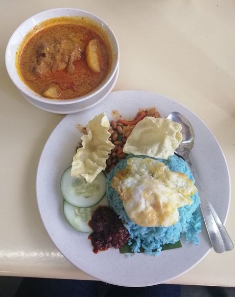 Nasi kerabu with Malaysian chicken curry