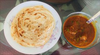 Parotta and chicken gravy - Chennai - Tamil Nadu - Parotta and chicken gravy1