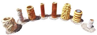 File:Spettekaka Trdelník Prügelkrapfen Baumstriezel Kürtőskalács Raguolis Baumkuchen Kürtősfánk.jpg