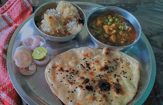 Tawa butter Naan with Matar Paneer masala and Suji Halwa